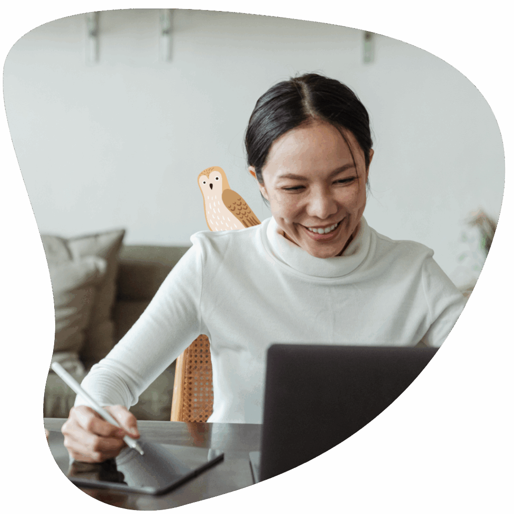 Smiling Woman on video call, owl graphic on her shoulder.